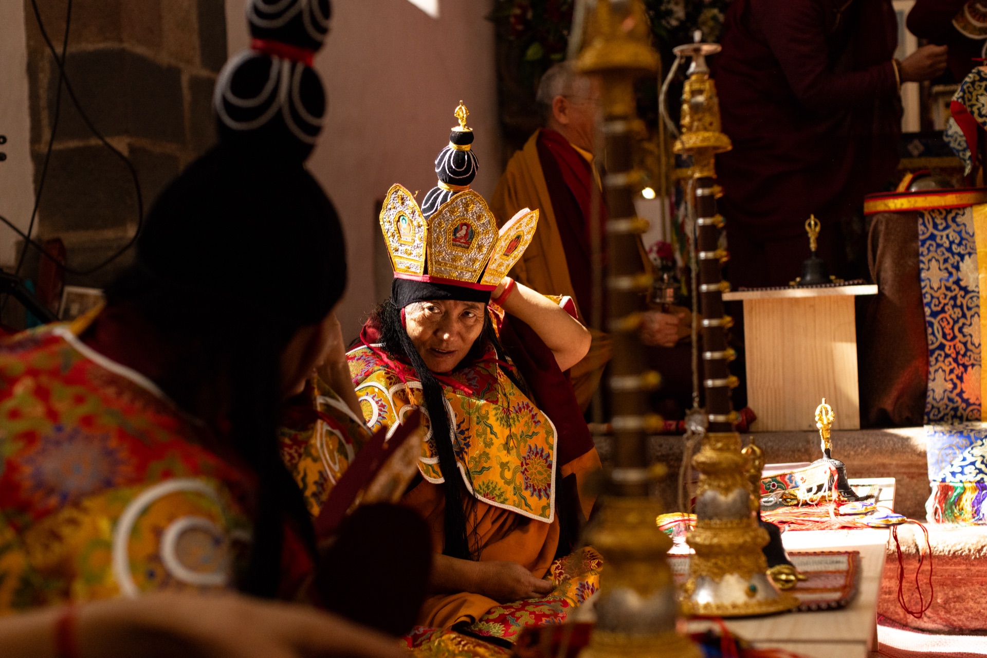 Buddhist nun in ceremonial hat at the Camino del Sol