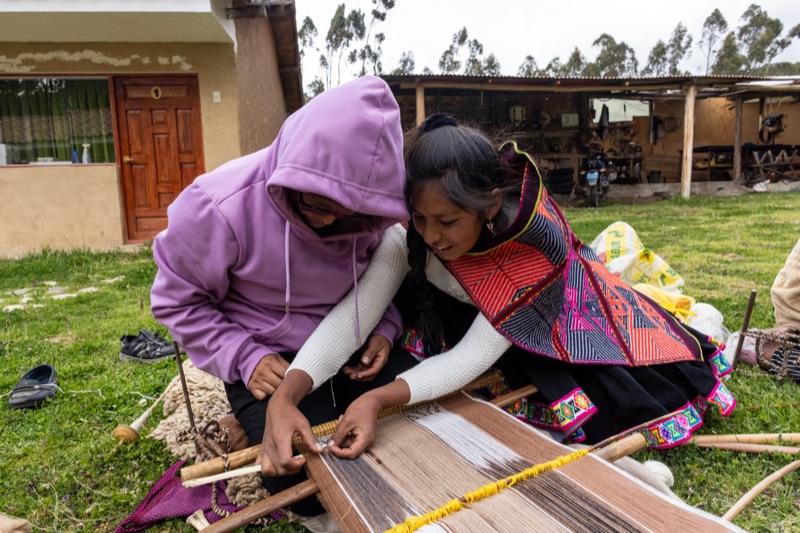 Paulina teaching weaving